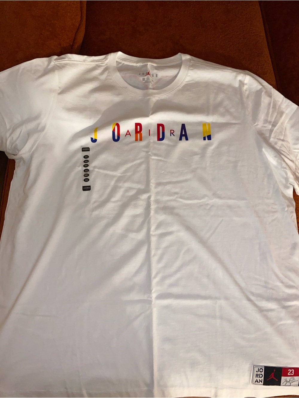 Jordan White Short Sleeve Tee with Multicolor Logo